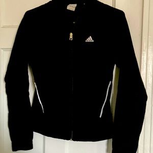 Used but in good condition. Adidas sweater with zipper